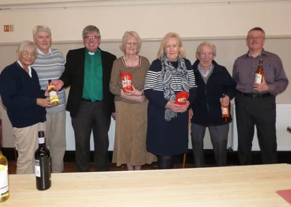 Winners Elizabeth Keimach and Tournament Director Guy Grainger, far left, with the Rev Canon Ian Robinson, third placed Pauline Green and Hazel Crockart, and second placed  Bill Gibbs and Phil Nattress.  (Lin) EMN-160418-115545001