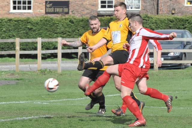 Michael Harness, scorer of Horncastle's second goal, steers a first half effort goalwards. Photo: Nigel West