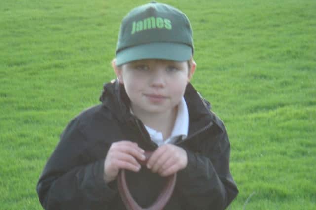 Young James prepares to do some digging.