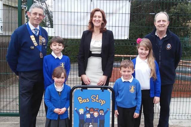Caistor Lions President Ron Lyus, left, with Bus Supervisor Rachel Jacklin, Lions Youth Officer Martyn Kemp and pupils Michael Conlin, Aimee-Louise Conlin, Jessica Bufform and Lewis Johnson. EMN-160419-145223001