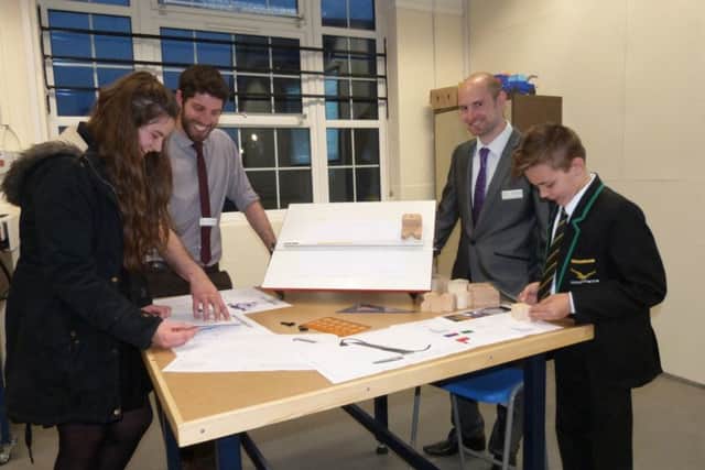 Isobelle Keyworth (yr9) and Tommy Newton (Yr 7) with Peter Eggington (teacher of Design and Technology and Engineering) and teacher Simon Chadwick. at the CYA Creativity Day (Lin) EMN-160417-075021001
