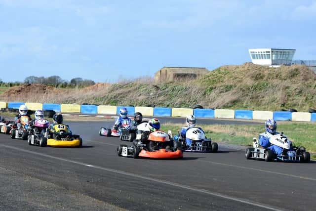 Shaun Lombardo (left) and Chris Beeson (right) on the front row of their grid in the 250 Gearbox race with John Faulkner on the third row EMN-160418-104911002