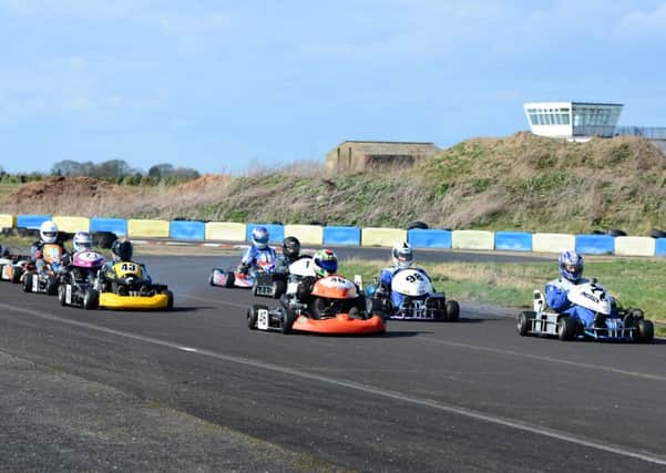 Shaun Lombardo (left) and Chris Beeson (right) on the front row of their grid in the 250 Gearbox race with John Faulkner on the third row EMN-160418-104911002