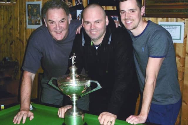 Del Hill, his son Tom and Stuart Bingham.