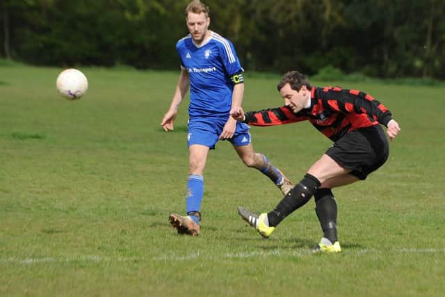Tom Baxter clears for Benington.