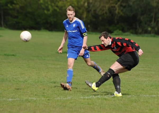 Tom Baxter clears for Benington.