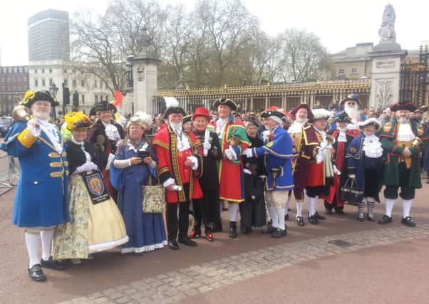 Sleaford Town Crier John Griffiths, on right, with the Loyal Company of Town Criers at Buckingham Palace. EMN-160426-121155001