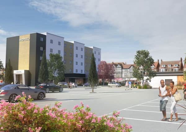 An artist's impression of plans for the Premier Inn in Skegness, with the Grosvenor Hotel in the background. ANL-160425-141222001