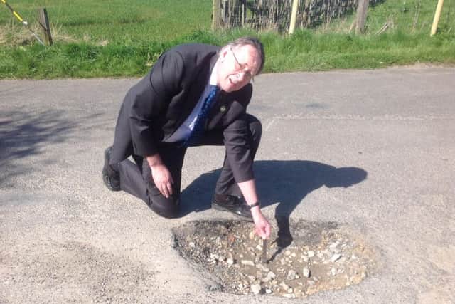 Councillor Stephen Palmer found the pothole in Crabtree Lane, Sutton on Sea.