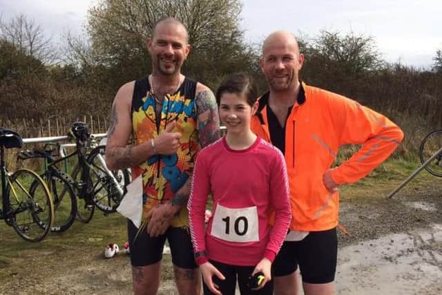 Carl Musson (left) with Phoebe and Guy Willey after the Go Tri competition EMN-160421-125606002