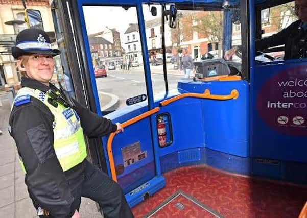 PCSO Lucy Holland-Hancock sets out on her Bus Beat patrol EMN-160427-103206001