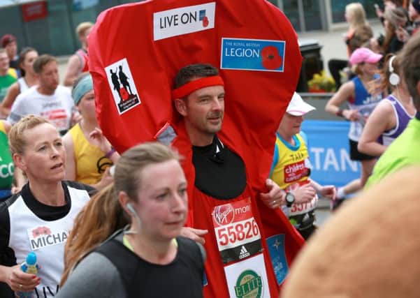 David and Michaela Moulds among the runners at this year's London Marathon EMN-160426-073346001