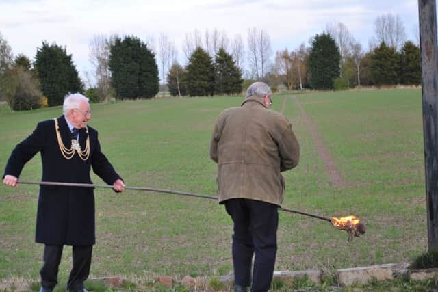 The Mayor of Boston lights a beacon for the Queen's 90th birthday at Kirton Holme Golf Club.