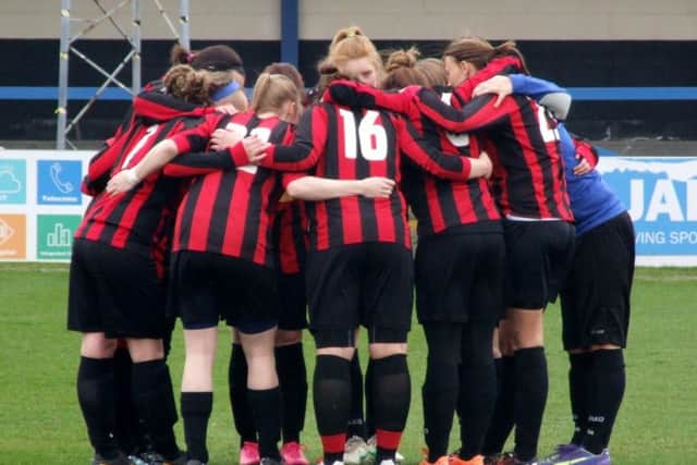 Louth Old Boys Ladies gee themselves up for the final EMN-160425-084137002