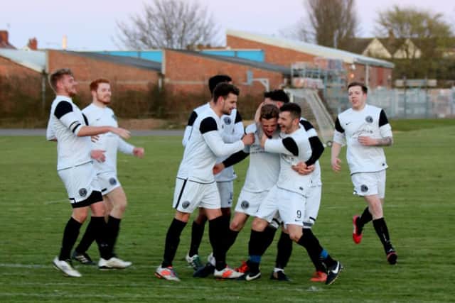 Skegness United celebrate their goal. Photo: Stephen Willmer.