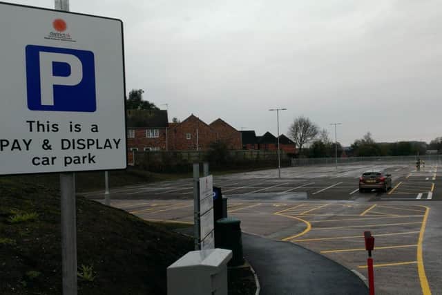 Almost deserted. The new Grantham Road car park on a Thursday morning. A sign reminds drivers to find a space before obtaining their ticket!