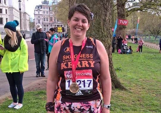 Kerry Bennett after completing the 26.2 mile London Marathon.