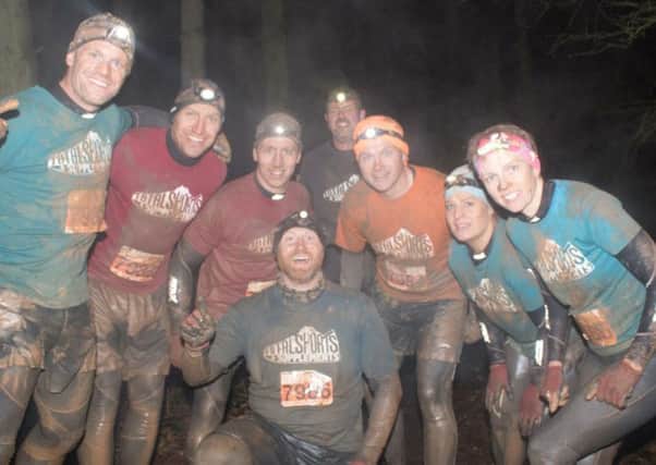 Total Sport mud running team.