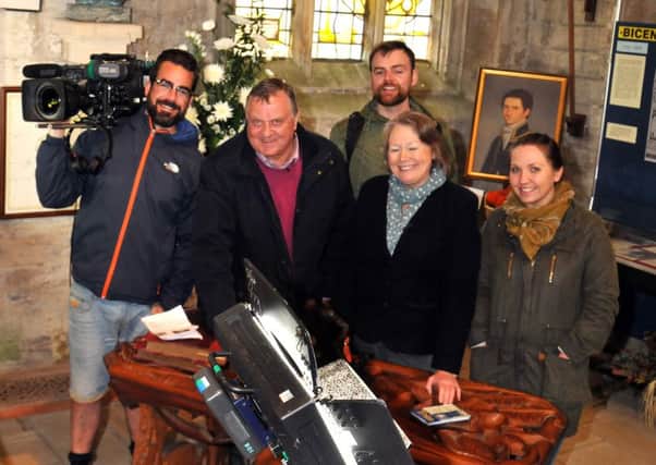FLINDERS' LOT: John Flinders, third generation ancestor of Captain Matthew Flinders, with  (front, second left) auctioneer Claire Rawle (front, second right) producer Jonathon Hayles,  researcher Paul MacGregor (back) and production assistant Anna-Ryan Kennedy at St Mary and the Holy Rood Church, Donington.  Photo by Tim Wilson.