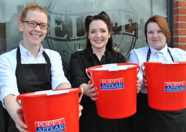 Lincolnshire wartime singer Heather Marie (pictured centre) will be performing at The Elite restaurant in Sleaford to raise funds for the Royal British Legion's Poppy Appeal. She is pictured here with Rachel Tweedale and Sophie Spright from The Elite Fish & Chip Company. EMN-160428-150200001