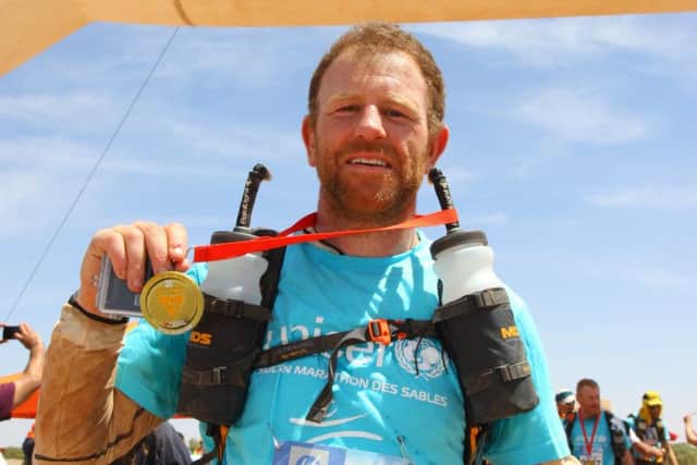 Craig pictured at the end of the gruelling journey.