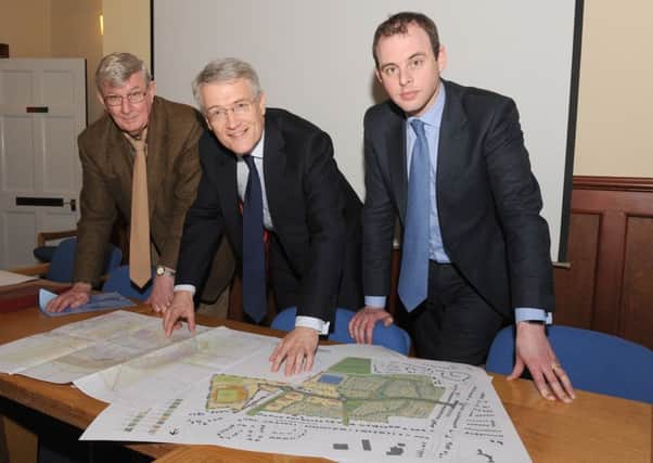 Parliamentary Under Secretary of State at the Department of Transport, Andrew Jones visited Boston in March to see plans and visit the site of The Quadrant. From left, Councillor Peter Bedford, Andrew Jones, Matt Warman MP. EMN-160429-111307001