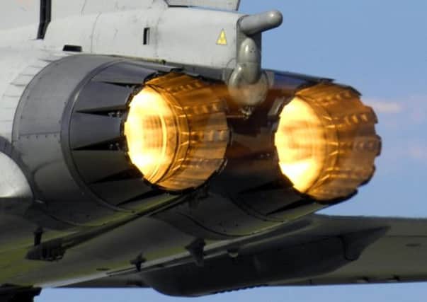 A Typhoon F2 fighter jet ignites its afterburners