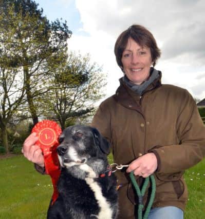 Jane Mead and Nero win first prize in the AQHA novelty dog show at Low Fulney. Photo by Tim Wilson.