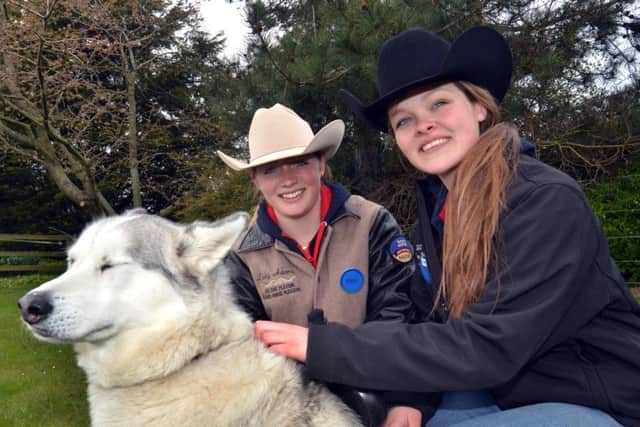 American quarter horse riders Claire Evans and Emily Sands host a novelty dog show at Unique Cottage Studios, Low Fulney, Spalding. Photo by Tim Wilson.
