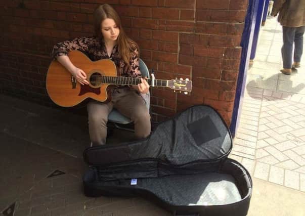 Ainjiel Shaolee busking over the weekend for Sleaford Live. Photo: Callum Thursby. EMN-160305-121922001