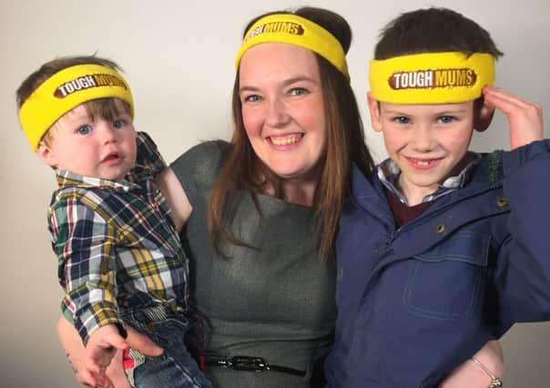 Tough Mum Kayleigh Boulton with sons Noah and Thomas. She will be running a 5K tough mudder event with 99 other mums for ITV's This Morning. EMN-160905-181519001