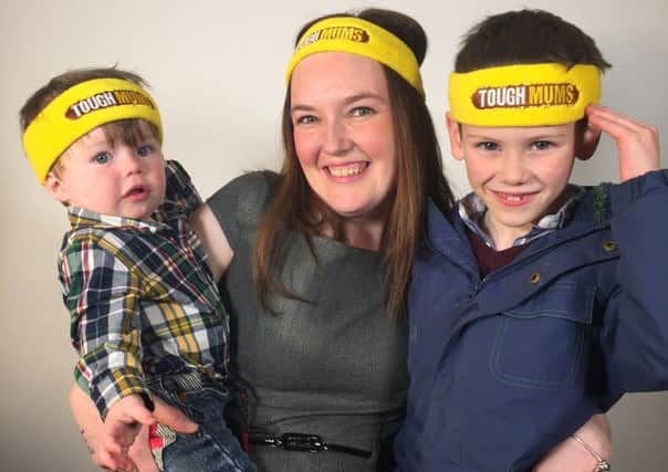 Tough Mum Kayleigh Boulton with sons Noah and Thomas. She will be running a 5K tough mudder event with 99 other mums for ITV's This Morning. EMN-160905-181519001
