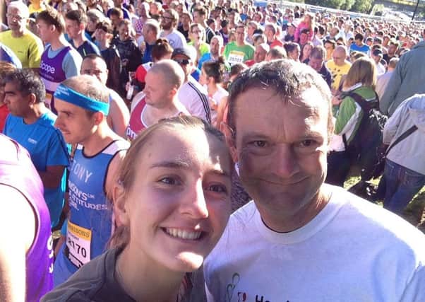 Henri Toone and her dad Nigel at the Great North Run last year EMN-160405-092827001