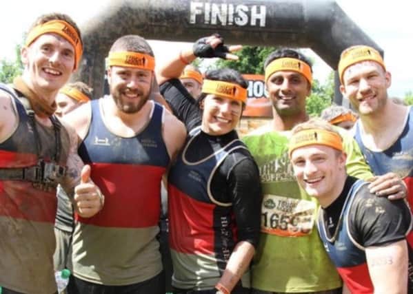 Some of the Sleaford Spartans team members from last year's Tough Mudder run. EMN-160405-102034001