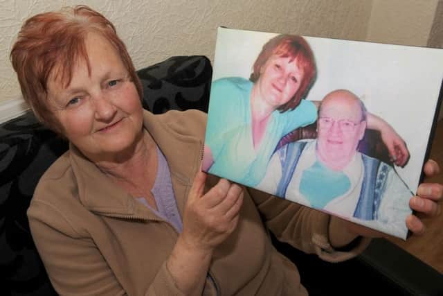 Shirley Cooper with a photograph of her dad. ANL-160605-154357001