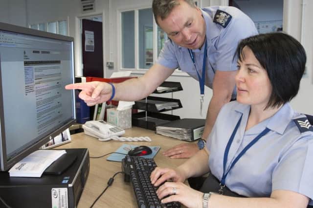 Warrant Officer Jon Sykes (sic) and Sergeant Hayley Sinclair (sic).Personnel from Human Resources Flight (HR) pictured here at work during the course of their duties at RAF Coningsby, Lincoln, Lincolnshire on 11 May 2013.Photo By:- Sgt Andy Benson(RAF)For further information contact RAF Coningsby Photographic Section:Photographic SectionRAF ConingsbyLincsLN4 4SYTel: 01526 347386 EMN-161205-093814001