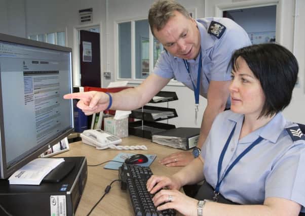 Warrant Officer Jon Sykes (sic) and Sergeant Hayley Sinclair (sic).Personnel from Human Resources Flight (HR) pictured here at work during the course of their duties at RAF Coningsby, Lincoln, Lincolnshire on 11 May 2013.Photo By:- Sgt Andy Benson(RAF)For further information contact RAF Coningsby Photographic Section:Photographic SectionRAF ConingsbyLincsLN4 4SYTel: 01526 347386 EMN-161205-093814001