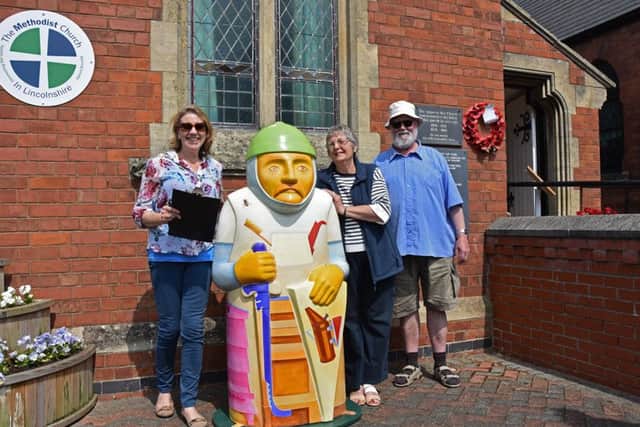Julie Blyth, Pat Hickey and Mike Fricke with Baron Beekeeper who welcomed the many visitors to Wragby Methodist Church as part of the Open Churches event..
Photo John Edwards. EMN-160905-073052001