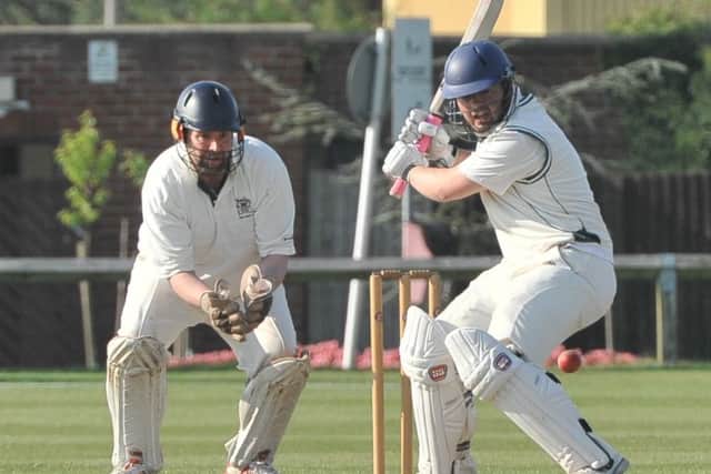 Tom Dixon on his way to 72 runs for Woodhall Spa at a sun-drenched Jubilee Park on Sunday. Photo: Nigel West