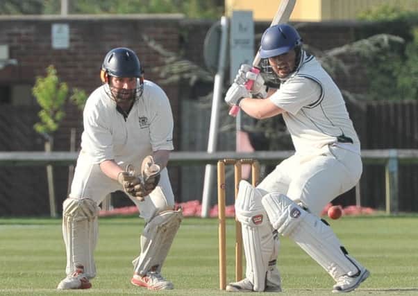 Tom Dixon on his way to 72 runs for Woodhall Spa at a sun-drenched Jubilee Park on Sunday. Photo: Nigel West