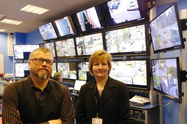 CCTV manager Andrew Haw and NKDC Community Safety Manager Heidi Ryder in the CCTV suite at Boston. EMN-160514-161247001