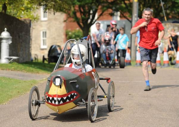 Team Sharks' cart from Bucknall, near Woodhall Spa. Rhys Redpath being pushed off at the start. Photo: MSSP-210614-5 EMN-160515-160852001