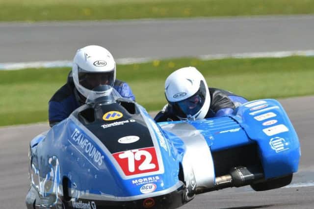 Pete Founds and Jevan Walmsley negotiate Donington Park EMN-160516-162742002