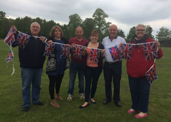 Bonny Smith (right) planning the Party in the park for the Queen's 90th birthday with (from left) Geoff Smith, Hilary Murray, Mole Anderson, Trish Tuplin and Martyn Tuplin. ANL-160516-180927001