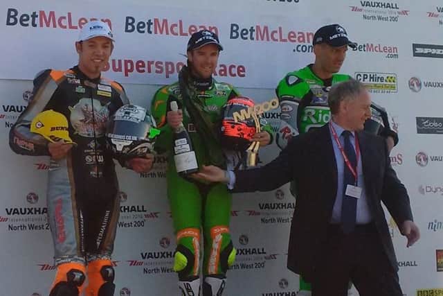 Hickman (left) on the Supersport podium EMN-160516-181319002