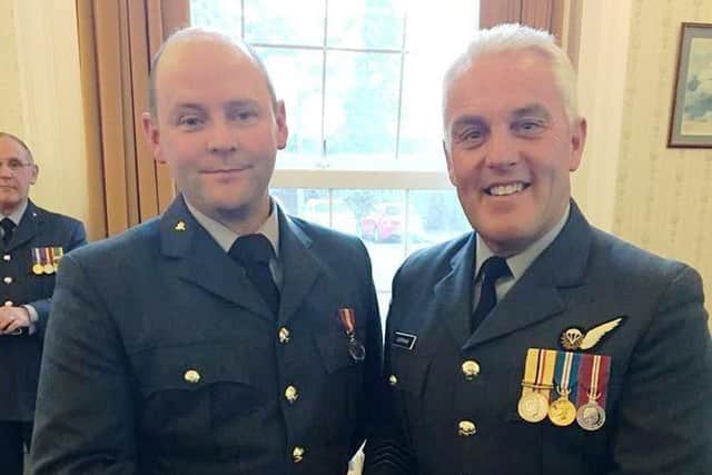 Louth officer Carl Johnson (left) recently received the Cadets Forces Medal.