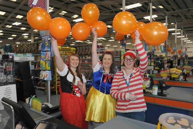 First birthday celebrations at B&M's store at the Alban Retail Park, Boston. Pictured (from left) Laura Kennerley - cash office supervisor, Sam Frankish - floor supervisor, and Sam Carter - cash office supervisor.
