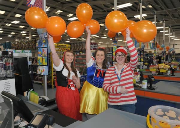 First birthday celebrations at B&M's store at the Alban Retail Park, Boston. Pictured (from left) Laura Kennerley - cash office supervisor, Sam Frankish - floor supervisor, and Sam Carter - cash office supervisor.