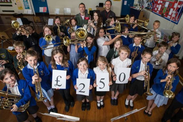 RAF Coningbsy Charity Commission recently donated ?250 to the Tattershall Primary School Music Club. EMN-160525-144045001