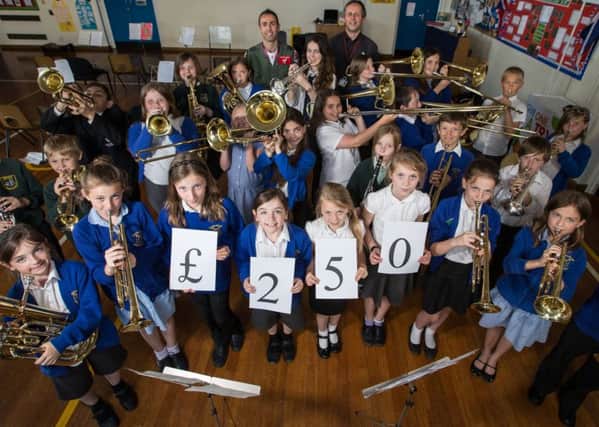 RAF Coningbsy Charity Commission recently donated ?250 to the Tattershall Primary School Music Club. EMN-160525-144045001